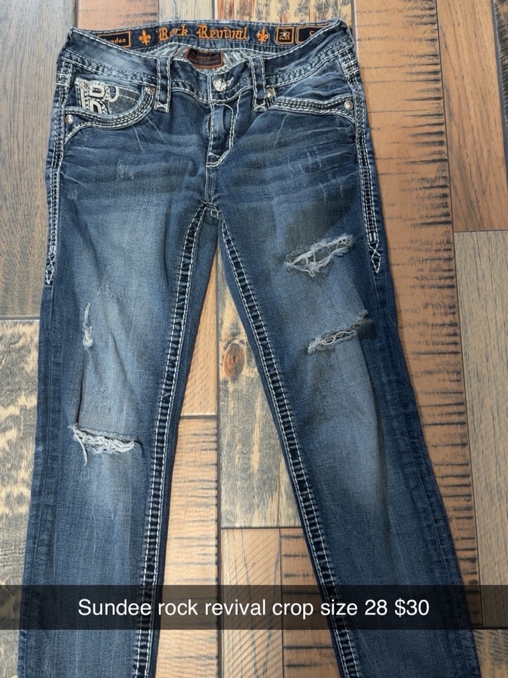 Rock Revival distressed cropped jeans in faded blue